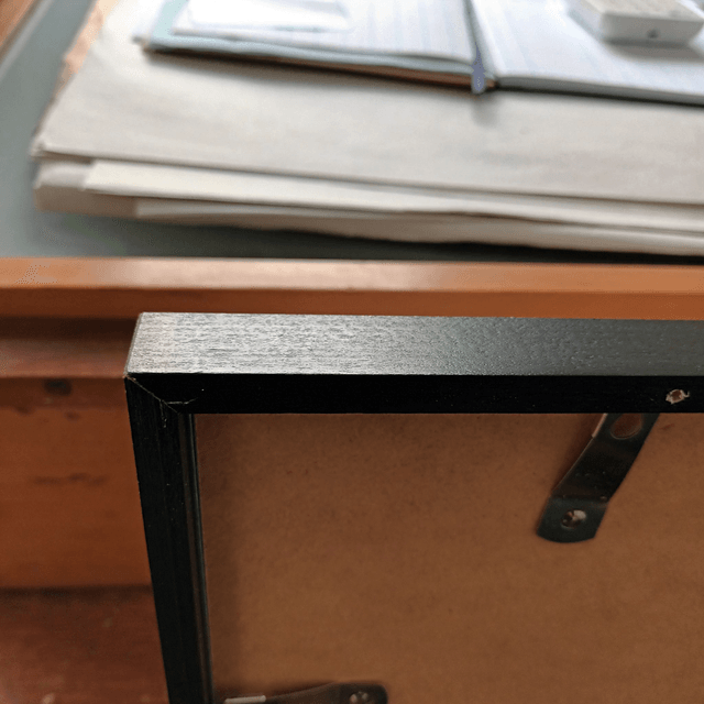 Wooden black painted frame with quality acrylic glass 70cmx100cm incl mount board.